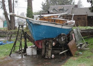 Note the nautical charm of carved trail boards and the vertical staving of the cabin.